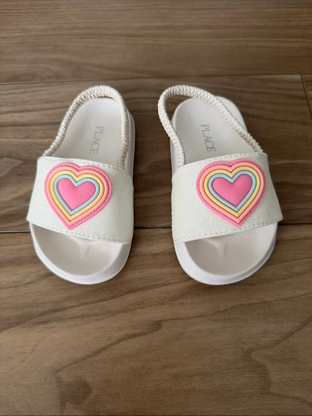 The Children's Place White Slide Sandals with Pink Rainbow Heart Accent